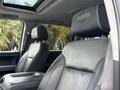 Interior view of a 2017 Chevrolet Silverado 1500 featuring black leather seats with high country branding on the headrests
