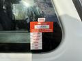 A 2014 International TerraStar vehicle with a red British Columbia certificate of approval sticker attached to the driver's side window