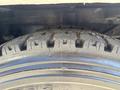 A close-up view of a tire on a 2017 Ford F-550 showing tread patterns and wear on the rubber surface