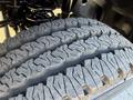 Detail of a 2023 RAM 3500 tire showing deep tread patterns designed for off-road and heavy-duty performance