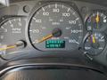 Dashboard of a 2007 GMC C4500 TopKick showing speedometer with 0 to 80 mph and fuel gauge indicating full along with odometer reading 126467 km