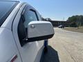 Close-up of the side mirror of a 2017 Chevrolet Colorado showing the vehicle's exterior details and design features
