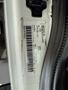A 2012 International DuraStar 4300 vehicle identification label with details like model number and manufacturing information