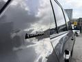 A gray 2021 Toyota 4Runner with the "Limited" badge prominently displayed on the side panel
