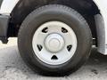 2008 Ford F-250 SD wheel with a silver rim and black tire showing tread pattern
