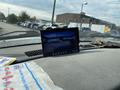 A 2009 Dodge Ram 5500 dashboard with a mounted screen displaying a rearview camera feed