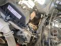 Close-up view of the engine compartment of a 2017 Ford F-150 showing various components including the alternator and engine parts