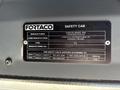 A metallic safety cab identification plate with information about a 2018 Sandvik Ranger DX800 including the manufacturer and model details