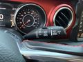 2021 Jeep Wrangler steering wheel controls including wiper settings and dashboard with speedometer and odometer displays