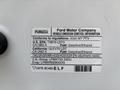 2020 Ford F-150 vehicle emission control information label showing compliance details and fuel type