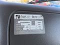 A Canada certification label from a 2011 Freightliner M2 106 detailing vehicle information and inspection data