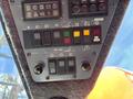 Control panel of a 2018 Sandvik Ranger DX800 featuring various switches and indicators for operational functions and status lights