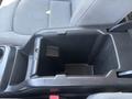 Interior console of a 2017 Chevrolet Colorado featuring a cubby storage compartment designed for small items