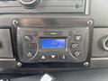 Dashboard control panel of a 2020 Chevrolet Express featuring buttons for air conditioning and fan settings along with a digital display showing the number 1.0