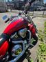 2007 Honda VTX1800F3 motorcycle in red with chrome accents showcasing a sleek design and visible engine components