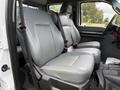 The image shows the front seats of a 2015 Ford F-350 SD featuring gray leather upholstery with a spacious interior designed for comfort and utility