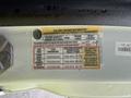 Tire and loading information label for a 2023 Ford Transit detailing seating capacity and recommended tire pressures