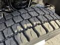 Close-up of a tire from a 2020 Ford F-550 showing deep treads and textured surface designed for traction and durability