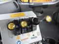 Control panel with levers and buttons labeled for snow plow functions including down up front left and right