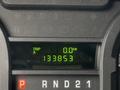 Dashboard of a 2013 Ford Econoline showing the trip meter reading 0.0 km and an odometer reading of 133863
