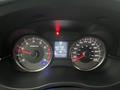 Dashboard of a 2016 Subaru Forester showing a speedometer and tachometer with illuminated warning light and digital display for speed and trip information