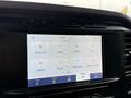 The image shows the touchscreen display of a 2021 Ford F-150 featuring various icons for phone lists sound vehicle settings clock and connectivity options