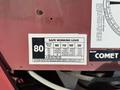 A label displaying safe working load specifications for a model Comet with various weight limits at different reach distances.