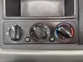 Control knobs for fan speed, air circulation, and temperature settings in a 2016 Peterbilt 348 truck dashboard