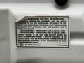 2001 Ford F-350 vehicle emission control information label displaying specifications for fuel tank capacity and evaporative family details