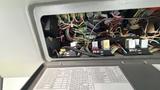 2021 Ford Transit with an open access panel revealing an array of colorful electrical wires and connectors with labels on the relays