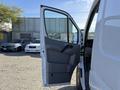 2016 Mercedes-Benz Sprinter with an open side door showcasing the interior and door design