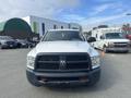 A 2012 RAM 2500 truck with a distinctive black grille and headlights facing forward