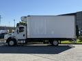 A white 2017 Freightliner M2 106 box truck with a tall cargo area and side truck doors