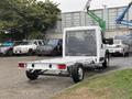 A 2023 RAM Promaster 3500 chassis cab with a bare frame and no cargo area visible