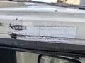 Label on the top of a 2011 Autocar Xpeditor providing vehicle noise emission control information and regulatory compliance details