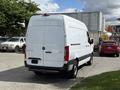 A white 2022 Mercedes-Benz Sprinter van with a high roof and a rear cargo door facing towards the viewer