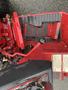 A red 2017 Ferris Rotary with a visible mower deck control panel and textured footrest area