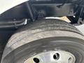 The image shows a close-up view of a tire mounted on a 2020 Freightliner MT45 showcasing the tread pattern and wheel rim
