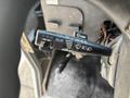 Close-up of the control stalk for the windshield wipers featuring settings for off delay and low with labeled icons for functionality