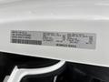 Close-up view of a vehicle identification label from a 2023 RAM Promaster 3500 displaying vehicle specifications and manufacturing details