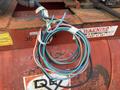 A bundle of multi-colored electrical wires secured with tape