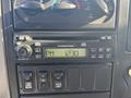 Interior dashboard of a 2008 International 4400 with a radio display showing time and several control buttons below