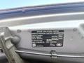 A vehicle emission control information label for a 2020 Jaguar XE