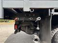 A close-up view of the underside of a 2016 RAM 5500 showcasing connectors and mechanical components attached to the chassis