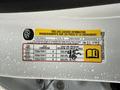 A tire information label on a 2015 GMC Sierra 1500 displaying specifications for tire sizes and recommended pressures