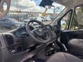 Interior view of a 2023 RAM Promaster 3500 showing the steering wheel dashboard and controls