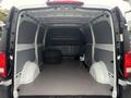 Interior of a 2021 Mercedes-Benz Metris van showing a spacious cargo area with a flat floor and no passenger seats visible
