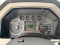 2008 Ford F-250 SD dashboard with speedometer tachometer fuel gauge and odometer display showing 115086 kilometers