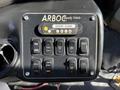 Control panel with various buttons labeled for functions like door ajar interior lights deploy stow and ramp heat