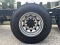 Front view of a Goodyear tire mounted on a wheel hub from a 2020 Lion Lion6 vehicle